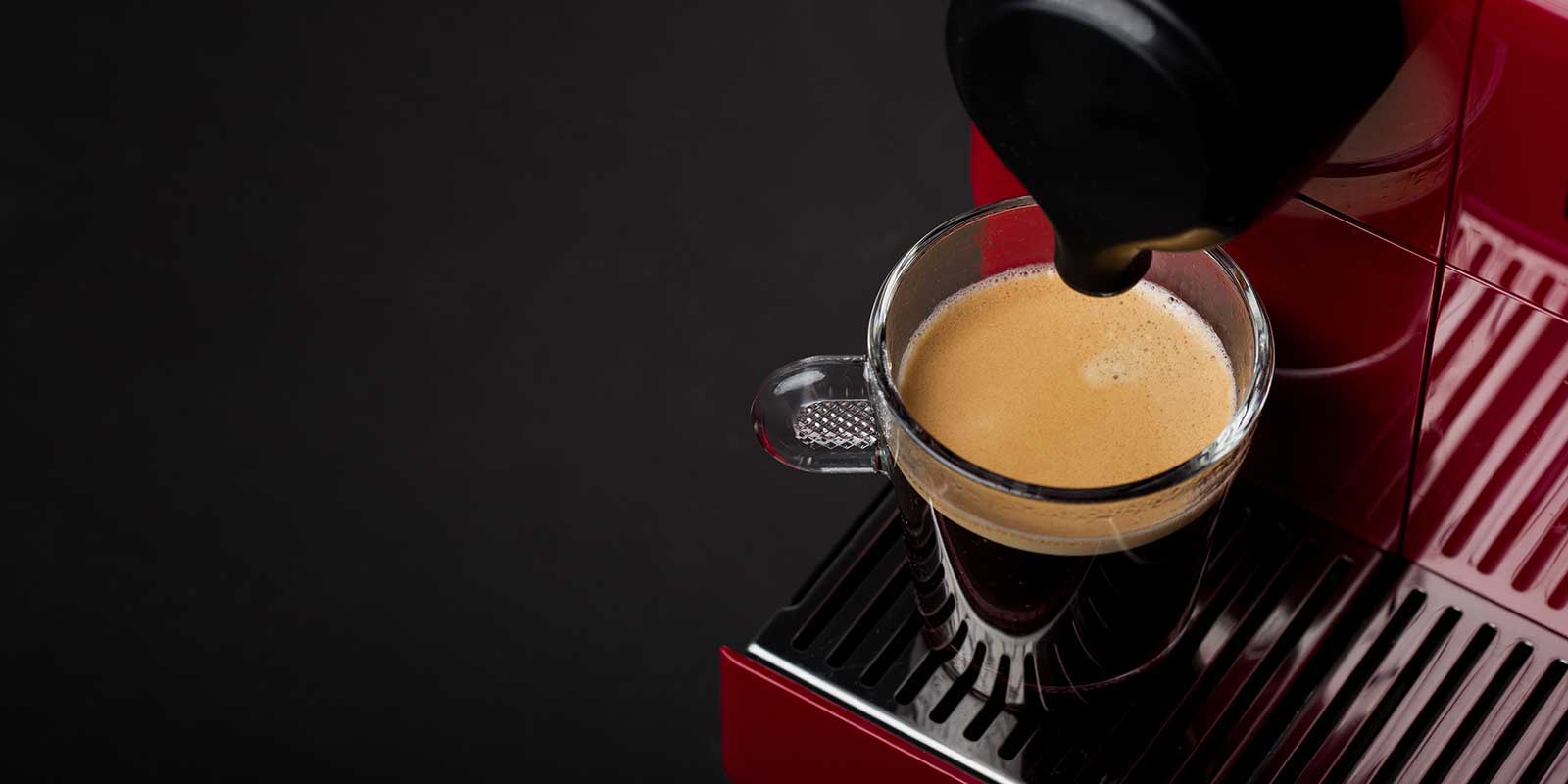 Fresh cup of coffee from a Nespresso coffee machine