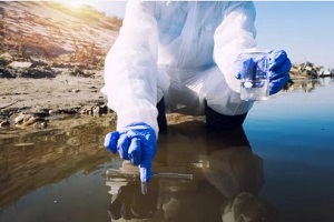 lab person testing water from the Red Hill fuel leak