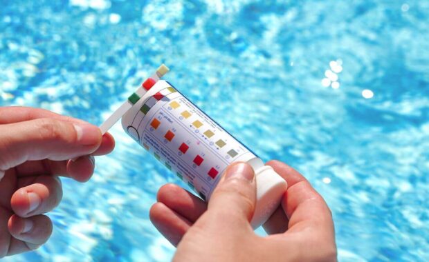 water quality of a pool with the help of a test strip with PH value